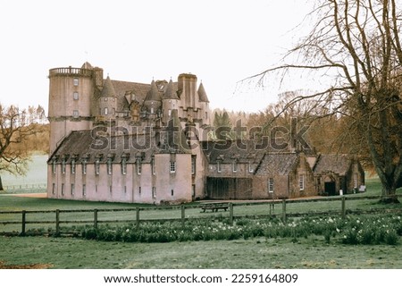 Backyard view of Fraser Castle, an elaborate Z-plan castle in Scotland and grandest Castle of Mar. 15th-century largest tower house in Scotland.  Royalty-Free Stock Photo #2259164809