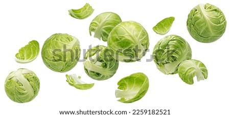 Falling brussels sprouts isolated on white background Royalty-Free Stock Photo #2259182521