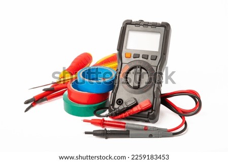 Electrician tools isolated on white background.Electrician tools set. Multimeter, construction tape, electrical tape, screwdrivers, pliers and an automatic insulation stripper. Royalty-Free Stock Photo #2259183453