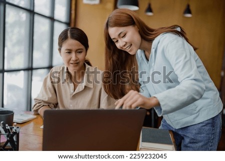 Asian student girl High School Tutor Individual Tuition From Teacher In Library. University Student Tutor books with friends Royalty-Free Stock Photo #2259232045