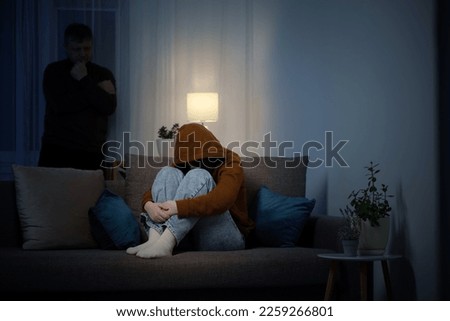 father and daughter teenager in  living room in  evening,  concept of problems in family Royalty-Free Stock Photo #2259266801