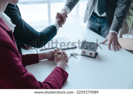 Businessperson real estate purchase agreement contract after sign official offer form is created by the homebuyer's agent and submitted to the seller
