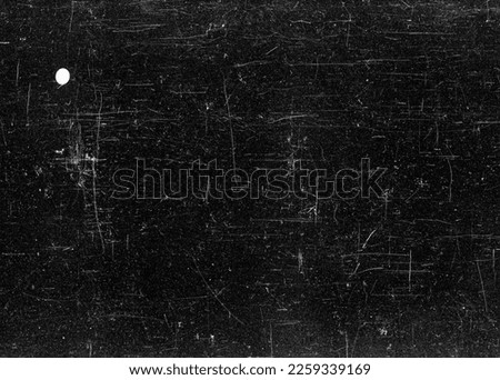 Dusty scratched and scanned old film texture Royalty-Free Stock Photo #2259339169