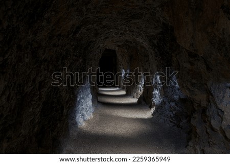 Aisle in a cave Cave exit of the Dechen Cave in Germany