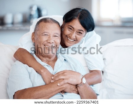Hug, love and senior couple portrait for happiness, gratitude and care on the living room sofa. Affection, happy and elderly man and woman on couch to relax during retirement freedom in the lounge