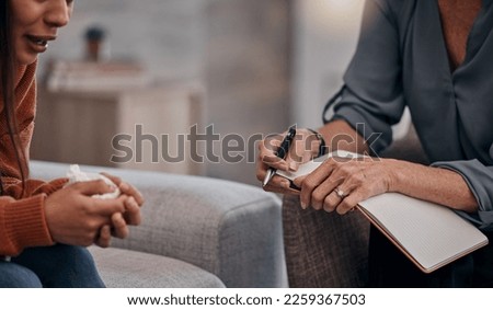 Crying, help and psychologist with a woman for therapy, depression notes and talking about trauma. Psychology, mental health and patient in counseling with a therapist writing the conversation Royalty-Free Stock Photo #2259367503