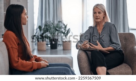 Mental health, help and psychologist with a woman for therapy, consultation and anxiety support. Psychology, helping and therapist talking to a patient about depression during counseling meeting Royalty-Free Stock Photo #2259367509
