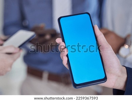 Green screen, phone and hands of business people for mobile app, design mockup and product placement. Smartphone, technology and blue background for communication, networking chat or social media ux