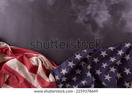 Happy presidents day concept with flag of the United States on dark background for top view concept