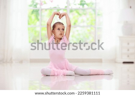 Baby ballet studio. Little ballerina in dance class. Cute girl in pink tutu and leotard learning to dance. Classic choreography for kids. Child dancer exercising. Kids practice full split.