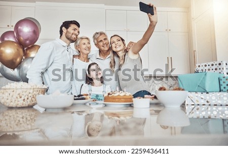 Birthday party, cake and family selfie in kitchen for happy memory, social media or profile picture. Love, food and girl, mother and grandparents taking pictures or photo together to celebrate event.