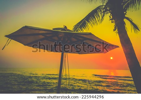 Silhouette pool beach and palm tree sunset times process vintage instagram effect style picture