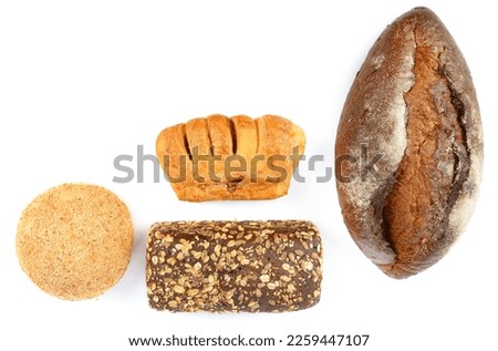 Bread and sweet pastry isolated on white background. View from above. Free space for text.