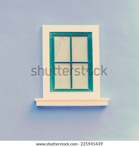 Beautiful window on color wall process vintage instagram effect style picture