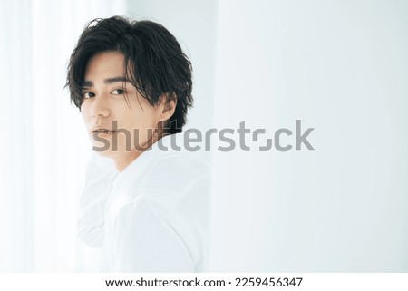 Portrait of young Asian man. Men's beauty concept. Men's cosmetics. Royalty-Free Stock Photo #2259456347