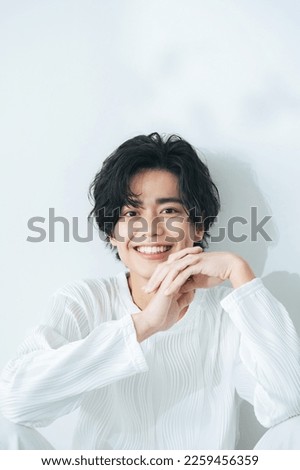 Portrait of young Asian man. Men's beauty concept. Men's cosmetics. Royalty-Free Stock Photo #2259456359