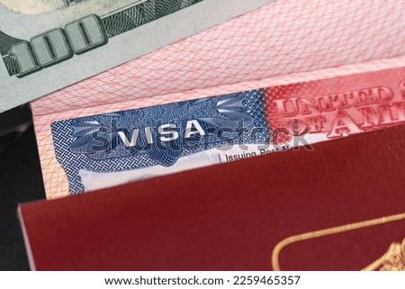 Russian passport with a US visa and a hundred dollars as a symbol of emigration