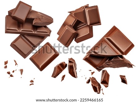 Dark chocolate chunks isolated on white background. Collection. Flying Chocolate pieces, shavings and cocoa crumbs Top view. Flat lay. Pattern
 Royalty-Free Stock Photo #2259466165