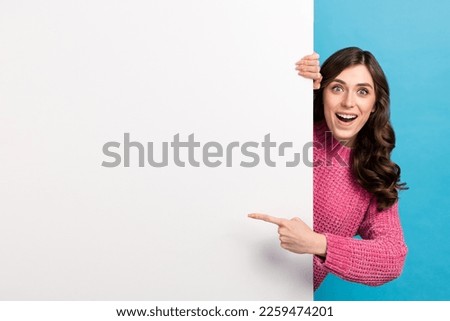 Photo of funky promo girl wear jumper shocked point finger poster cheap clothes brand discount third product free isolated on blue color background