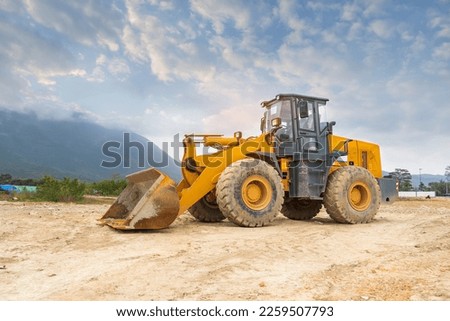 bulldozer on a building site Royalty-Free Stock Photo #2259507793