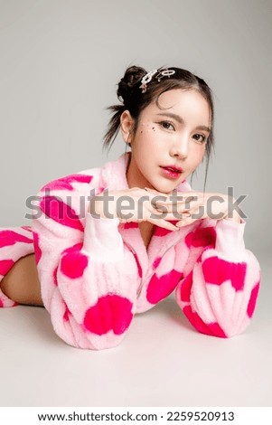 Young Pretty Asian woman have prefect slim fit body in heart print dress with makeup on face isolated on white background. Valentine, love, plastic surgery concept. Royalty-Free Stock Photo #2259520913