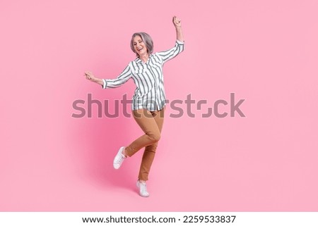 Full length photo of shiny adorable woman dressed smart casual outfit having fun empty space isolated pink color background Royalty-Free Stock Photo #2259533837