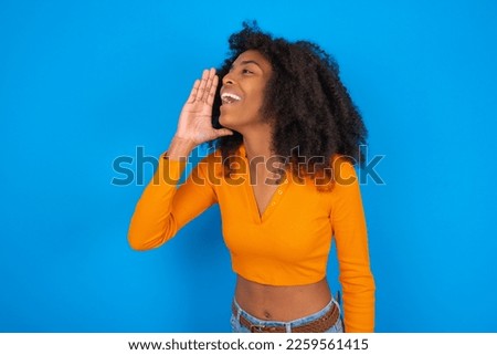 MODEL look empty space holding hand face and screaming or calling someone. Royalty-Free Stock Photo #2259561415