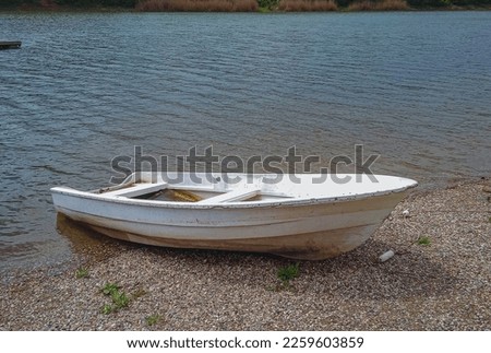 20.04.2021. Kragujevac, Serbia. Outdoor photo shoot in public park. Boat in the lake.