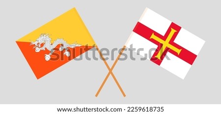 Crossed flags of Bhutan and Bailiwick of Guernsey. Official colors. Correct proportion. Vector illustration
