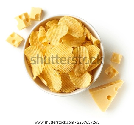 Bowl of crispy wavy potato chips or crisps with cheese flavor isolated on white background, top view Royalty-Free Stock Photo #2259637263