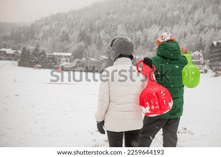 Beautiful  couple in love spending time outdoor on a snowy winte