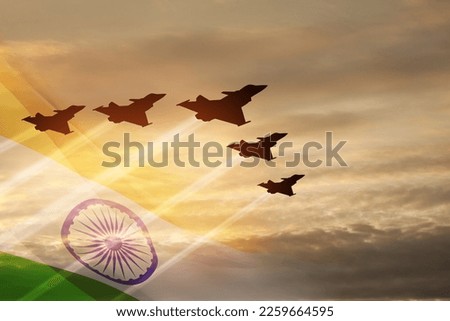 Indian Air Force Day. Indian jet air shows on background of sunset with transparent Indian flag. Commemorate Indian Air Force Day on October 8 in India. Royalty-Free Stock Photo #2259664595