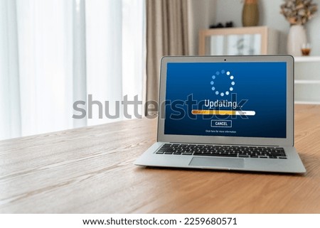 Software update on computer for modish version of device software upgrade Royalty-Free Stock Photo #2259680571