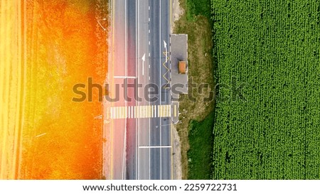 Truck from height rides on expensive solar glare. High quality photo