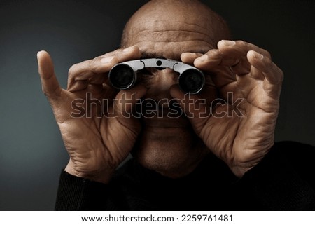 looking through binoculars with white background with people stock photo	