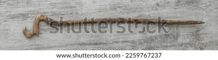 prophet staff on white wooden background Royalty-Free Stock Photo #2259767237