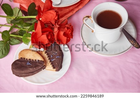 Heart shaped St Valentines cookies, coffee and red roses. Vegan cookies with orange curd. Aesthetics pink holiday flat lay