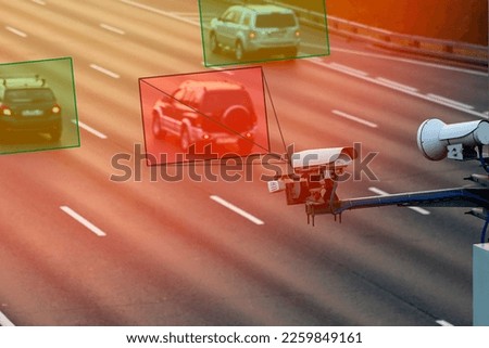 Ai tracking traffic automobile, Camera that controls speeding cars and speeding on the road. The camera reads the speed, Artificial intelligence that tracks traffic, a car that recognizes the speed Royalty-Free Stock Photo #2259849161