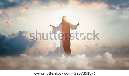 The resurrected Jesus Christ ascending to heaven above the bright light sky and clouds and God, Heaven and Second Coming concept
 Royalty-Free Stock Photo #2259851371