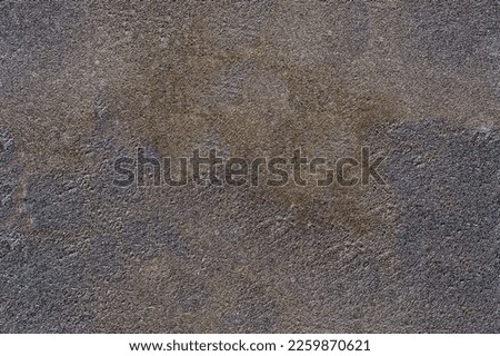 An interesting decorative texture in the form of rust effect plaster, a beautiful dark background for use in printing, web design, outdoor advertising, interior design and many other areas.