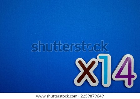 The colorful ×14 inscription placed on the lower right of the blue background.