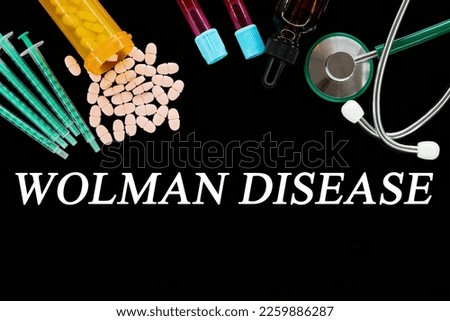 Wolman Disease text on medical background with pills and syringes Concept of human disease