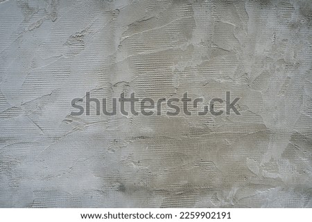 The texture of the cement wall with the joints after the trowel