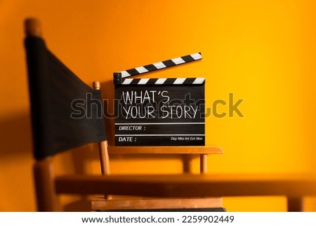 What's your story.text title on movie clapper board and director chair.
 Royalty-Free Stock Photo #2259902449
