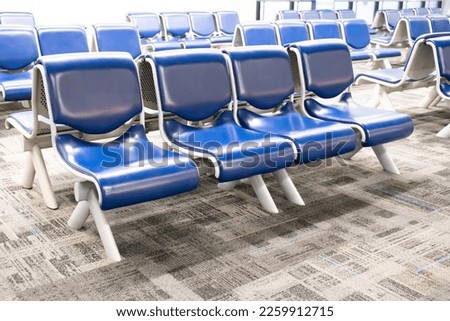 airport seat chair passenger seat Empty metal chair in the airport waiting room furniture pictures Airport departure or arrival concept image. Indoor detail of public area.