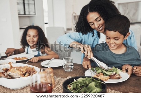 Mom, children and eating food in home together for lunch, dinner table and healthy meal. Happy family, mother and kids smile for dining in house with love, care and happiness of delicious supper
