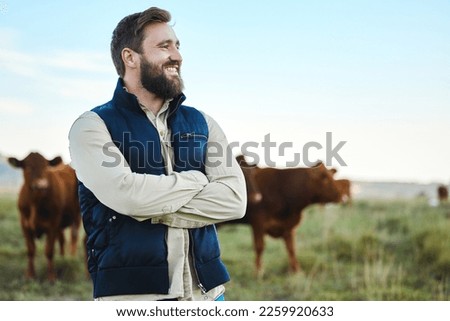 Smile, cow and agriculture with man on farm for sustainability, production or thinking industry growth. Agro, arms crossed or management of farmer on countryside field for dairy, animals for nature Royalty-Free Stock Photo #2259920633