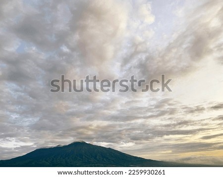 Mountain view with lots of clouds at sunrise