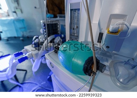 Medical equipment, apparatus for artificial lung ventilation. Selective focus on intubation mask. Closeup. Royalty-Free Stock Photo #2259939323