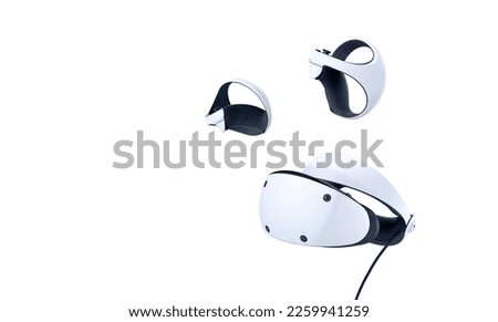 Virtual Reality console and controllers isolated on white background Royalty-Free Stock Photo #2259941259